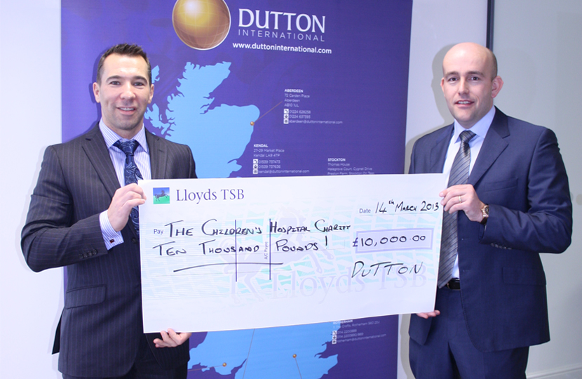 Cardiff Branch Manager, Jonathan Hann (left) and Managing Director, Matthew Davison (right) present a cheque earlier this year